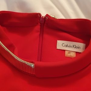 Calvin Klein flattering red dress with gold insert